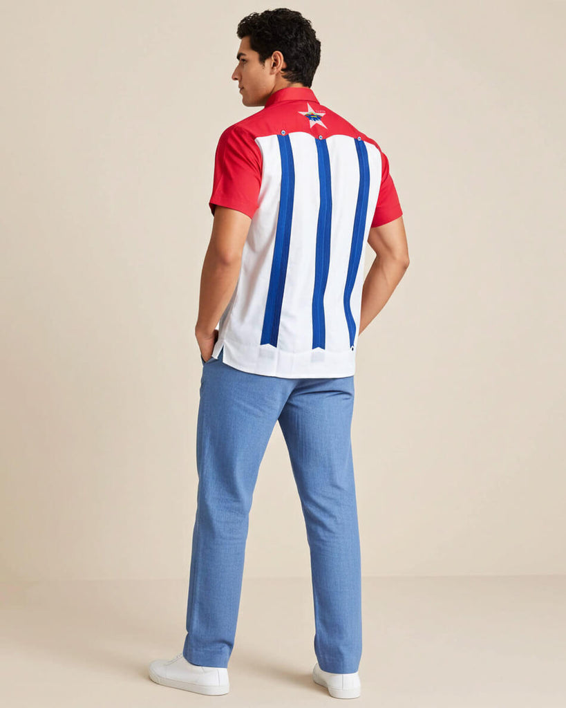 Person wearing a red, white, and blue striped shirt with a star on a beige background