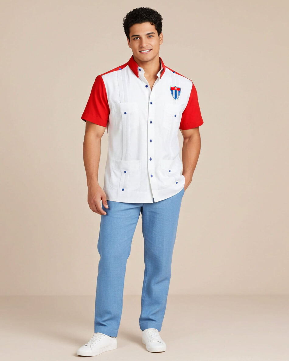 Man wearing a white shirt with red sleeves and blue pants on a beige background