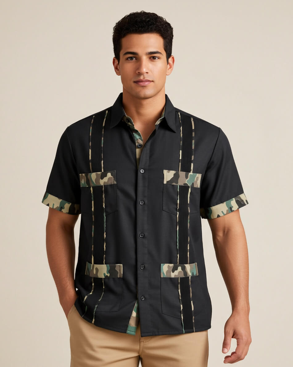 Man wearing a black camo guayabera shirt with camouflage patterns on a beige background