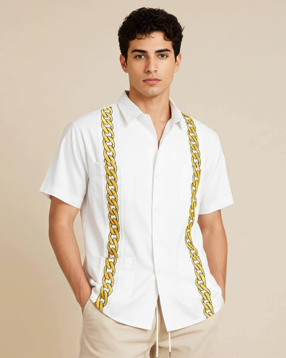 Man wearing a white shirt with gold chain details on a beige background
