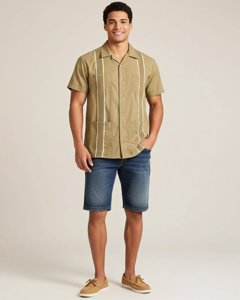 Man wearing a khaki guayabera button-up guayabera shirt with white stripes on a beige background