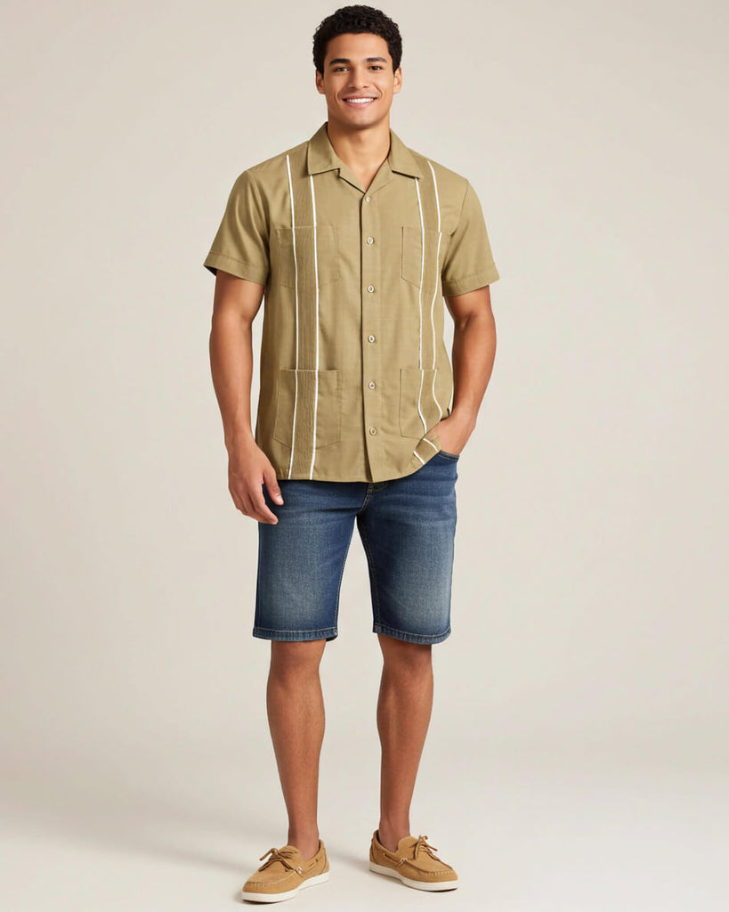 Man wearing a khaki guayabera button-up guayabera shirt with white stripes on a beige background