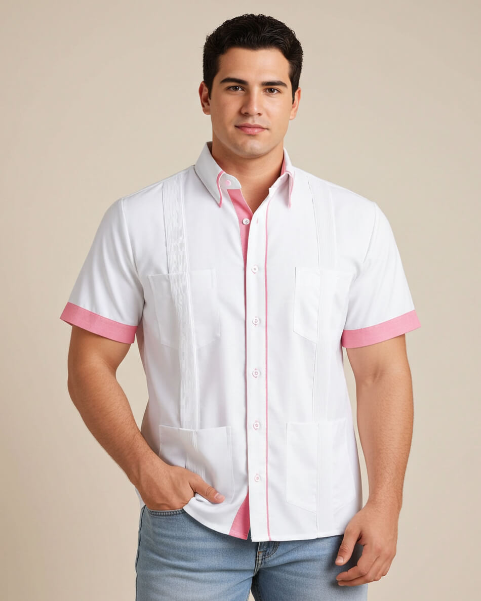 Man wearing a white guayabera shirt with pink accents on a beige background