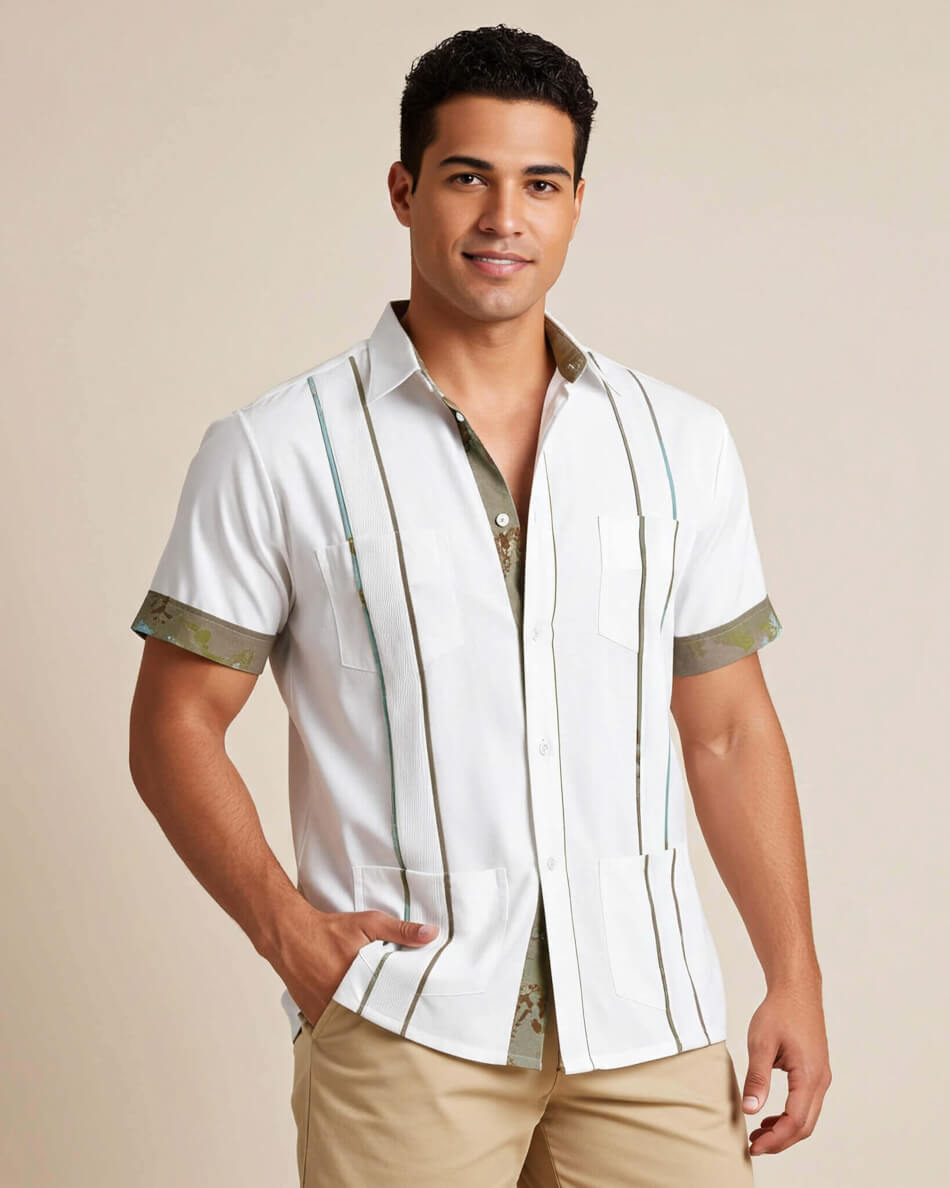 Man wearing a white short-sleeve guayabera shirt with green camoflauge accents on a beige background