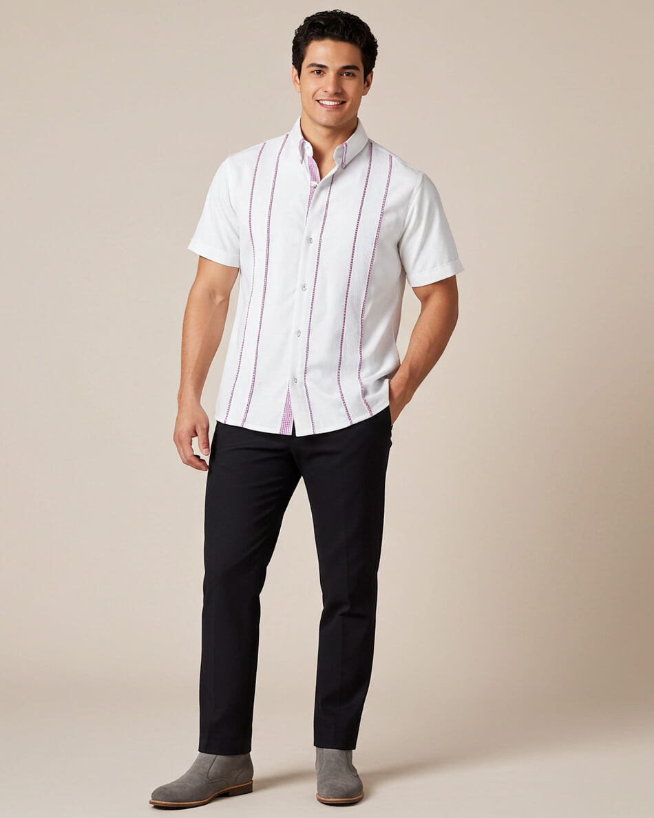 Man wearing a white shirt with purple gingham and black pants on a beige background